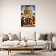Unframed poster print of Raphael's The Wedding of the Virgin displayed on a wall in a office
