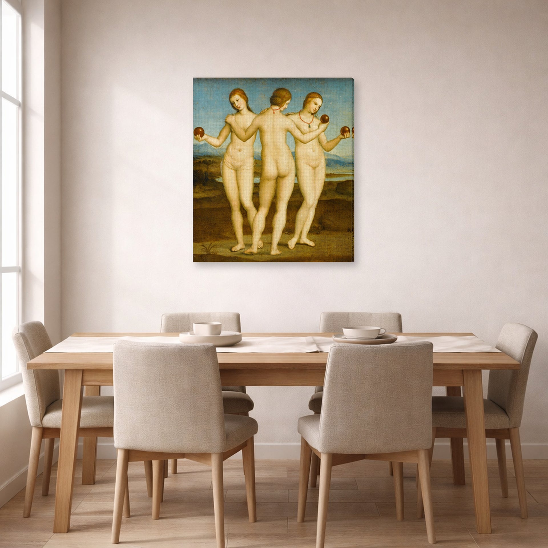 Gallery-wrapped canvas print of Raphael's Three Graces displayed on a wall in a dining