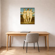 Unframed poster print of Raphael's Three Graces displayed on a wall in a office