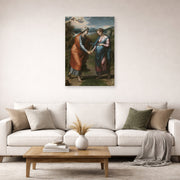Unframed poster print of Raphael's Visitacion displayed on a wall in a living room