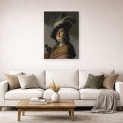 Unframed poster print of Rembrandt's A Man in a Gorget and Cap displayed on a wall in a living room