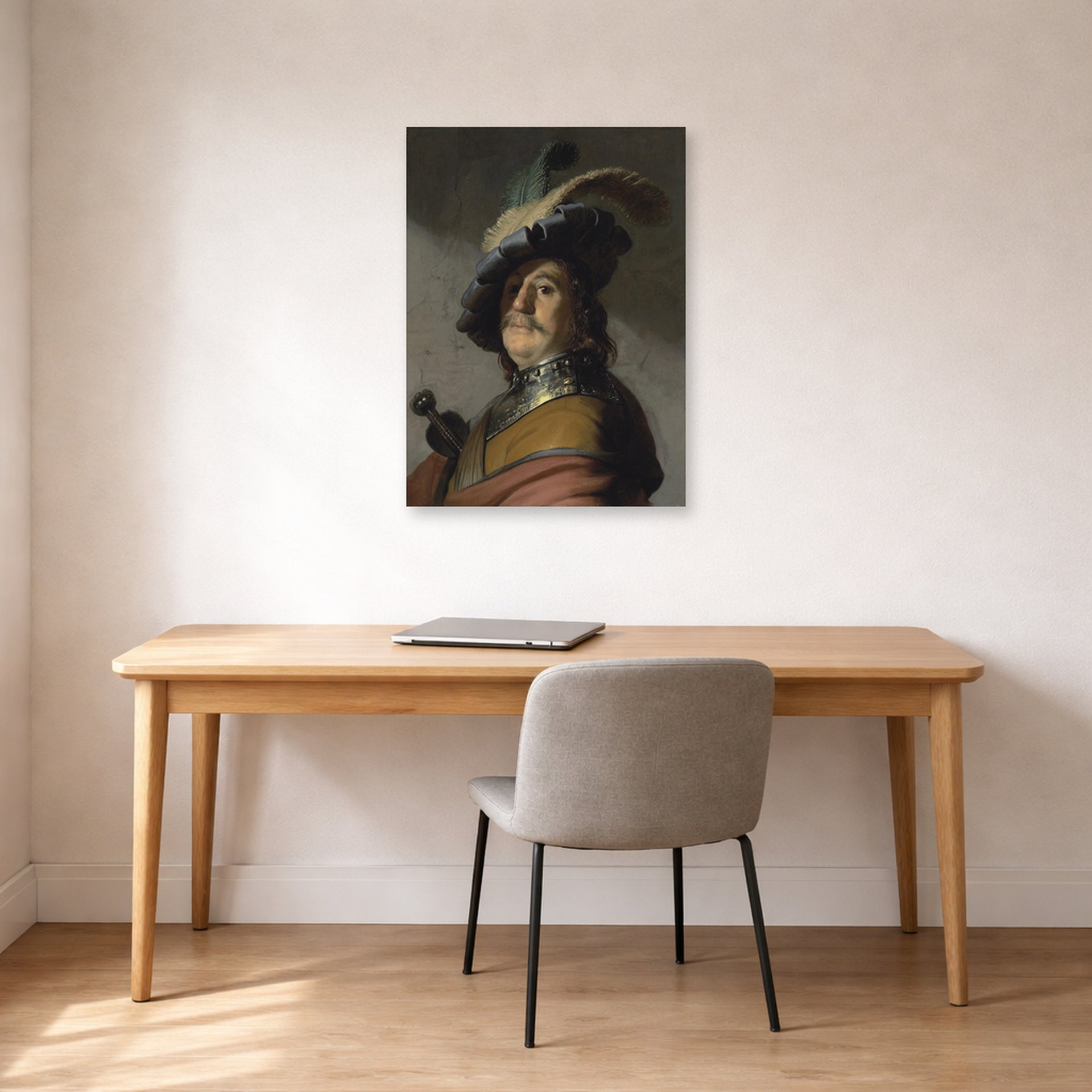 Unframed poster print of Rembrandt's A Man in a Gorget and Cap displayed on a wall in an office