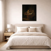 Gallery-wrapped canvas print of Rembrandt's A Scholar in His Study displayed on a wall in a bedroom