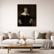 Gallery-wrapped canvas print of Rembrandt's A Woman Holding a Pink displayed on a wall in a living room