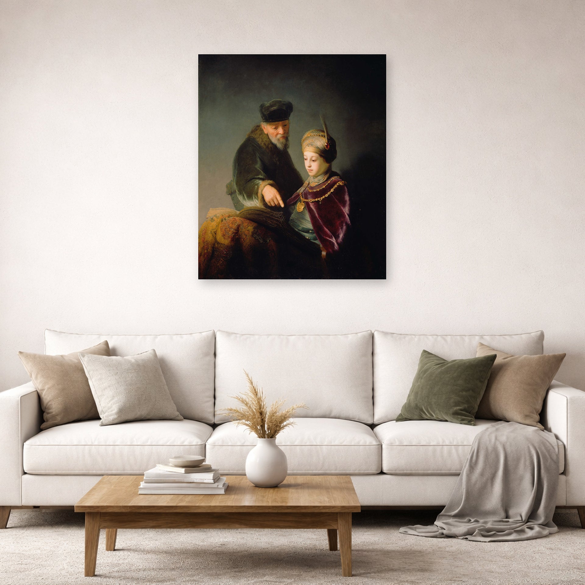 Unframed poster print of Rembrandt's A Young Scholar and His Tutor displayed on a wall in a living room