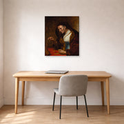 Gallery-wrapped canvas print of Rembrandt's An Old Woman Weighing Gold Coins displayed on a wall in an office