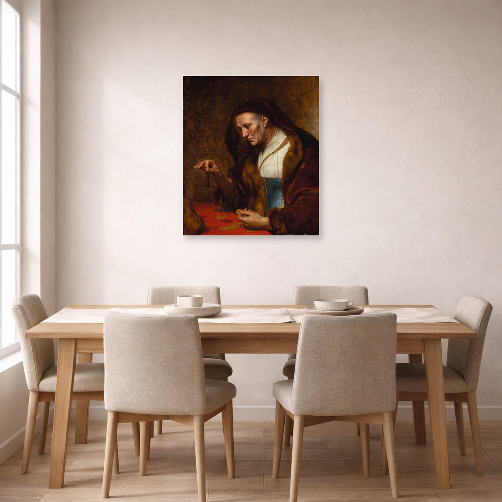 Unframed poster print of Rembrandt's An Old Woman Weighing Gold Coins displayed on a wall in a dining room