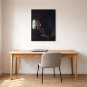 Gallery-wrapped canvas print of Rembrandt's Anna and the Blind Tobit displayed on a wall in an office