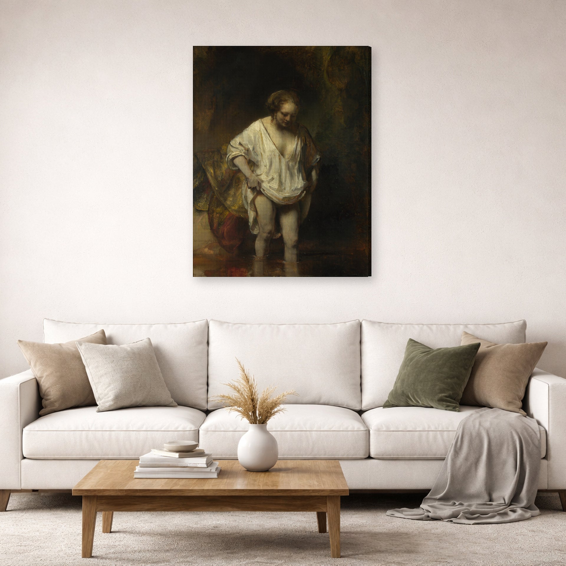 Gallery-wrapped canvas print of Rembrandt's Bathing Girl displayed on a wall in a living room