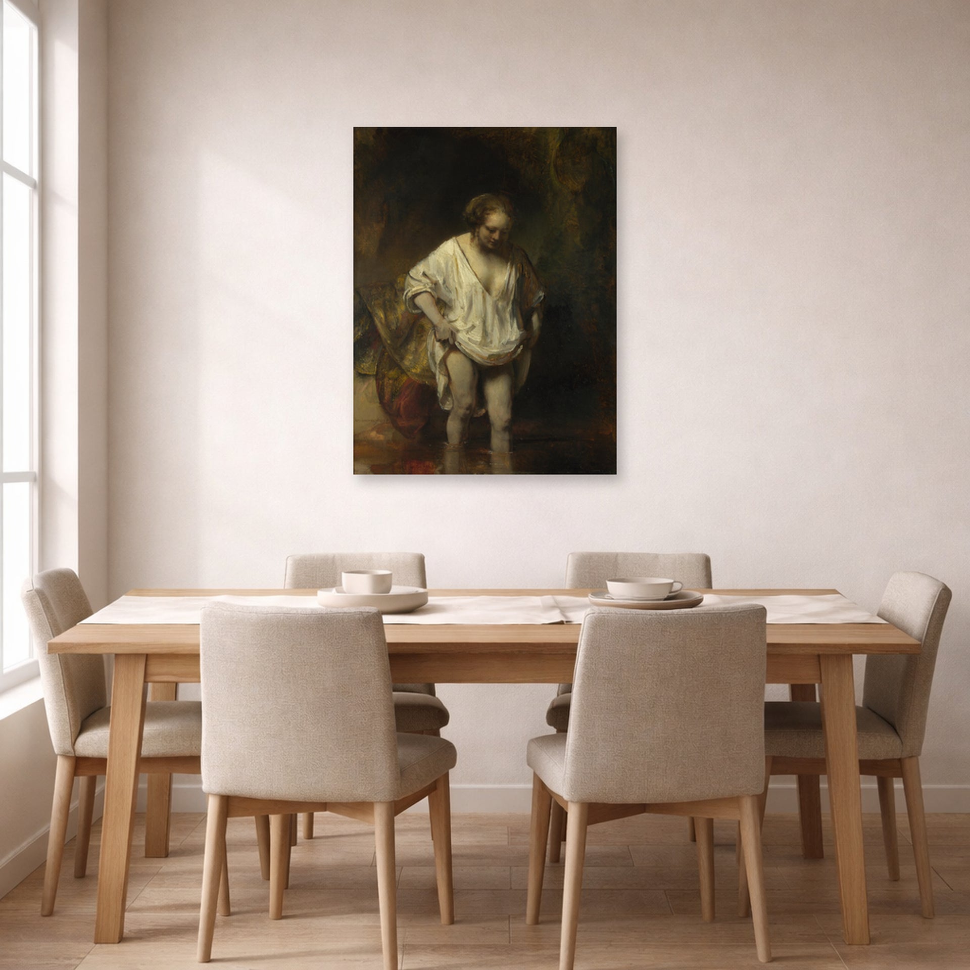 Unframed poster print of Rembrandt's Bathing Girl displayed on a wall in a dining room