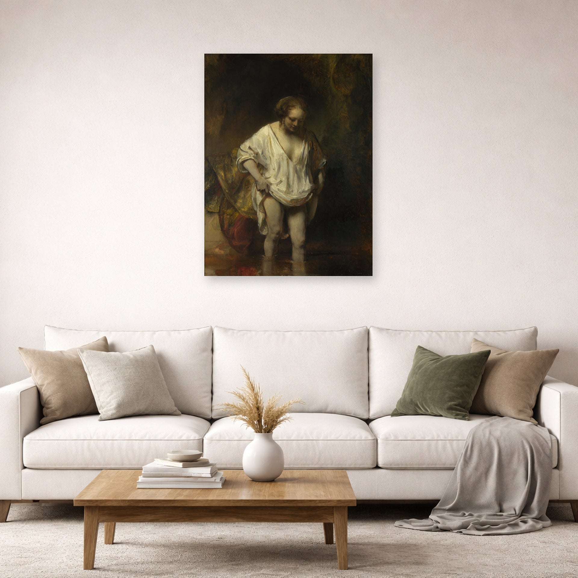 Unframed poster print of Rembrandt's Bathing Girl displayed on a wall in a living room
