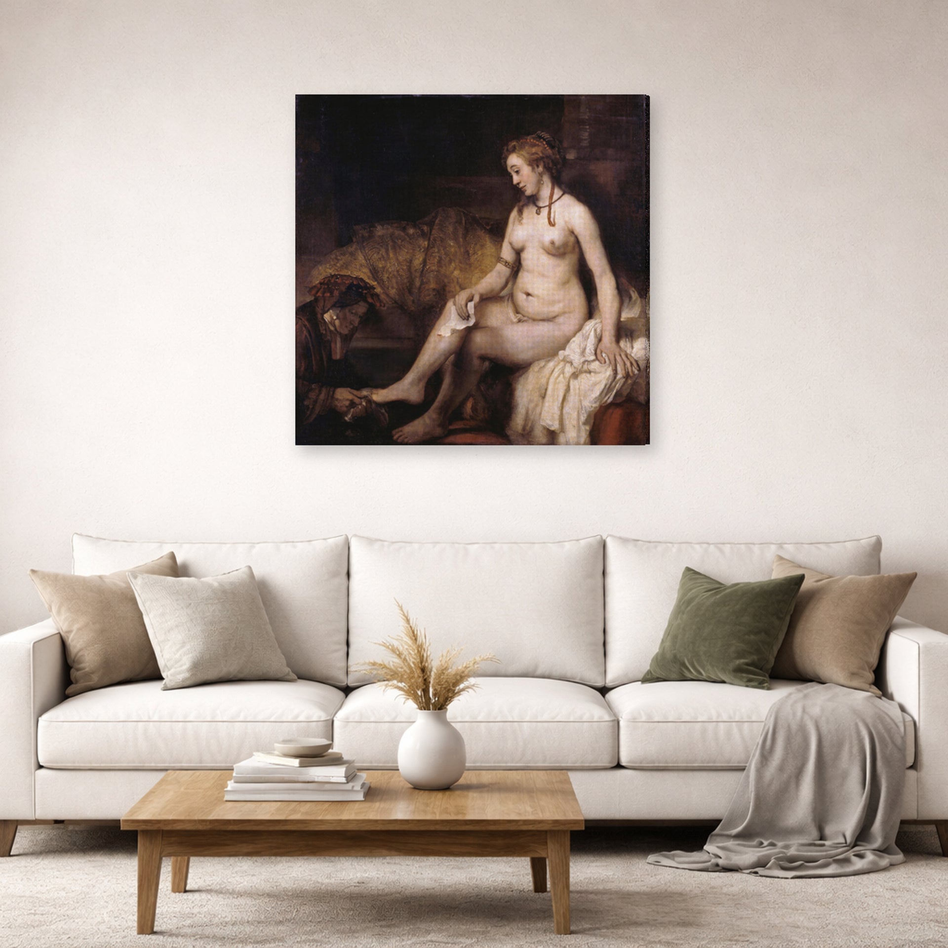 Gallery-wrapped canvas print of Rembrandt's Bathsheba at Her Bath displayed on a wall in a living room