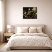 Gallery-wrapped canvas print of Rembrandt's Belshazzars Feast displayed on a wall in a bedroom