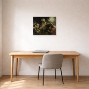 Unframed poster print of Rembrandt's Belshazzars Feast displayed on a wall in an office