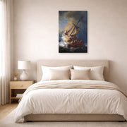 Gallery-wrapped canvas print of Rembrandt's Christ in the Storm on the Lake of Galilee displayed on a wall in a bedroom
