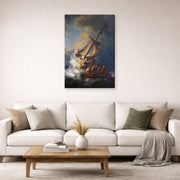 Gallery-wrapped canvas print of Rembrandt's Christ in the Storm on the Lake of Galilee displayed on a wall in a living room