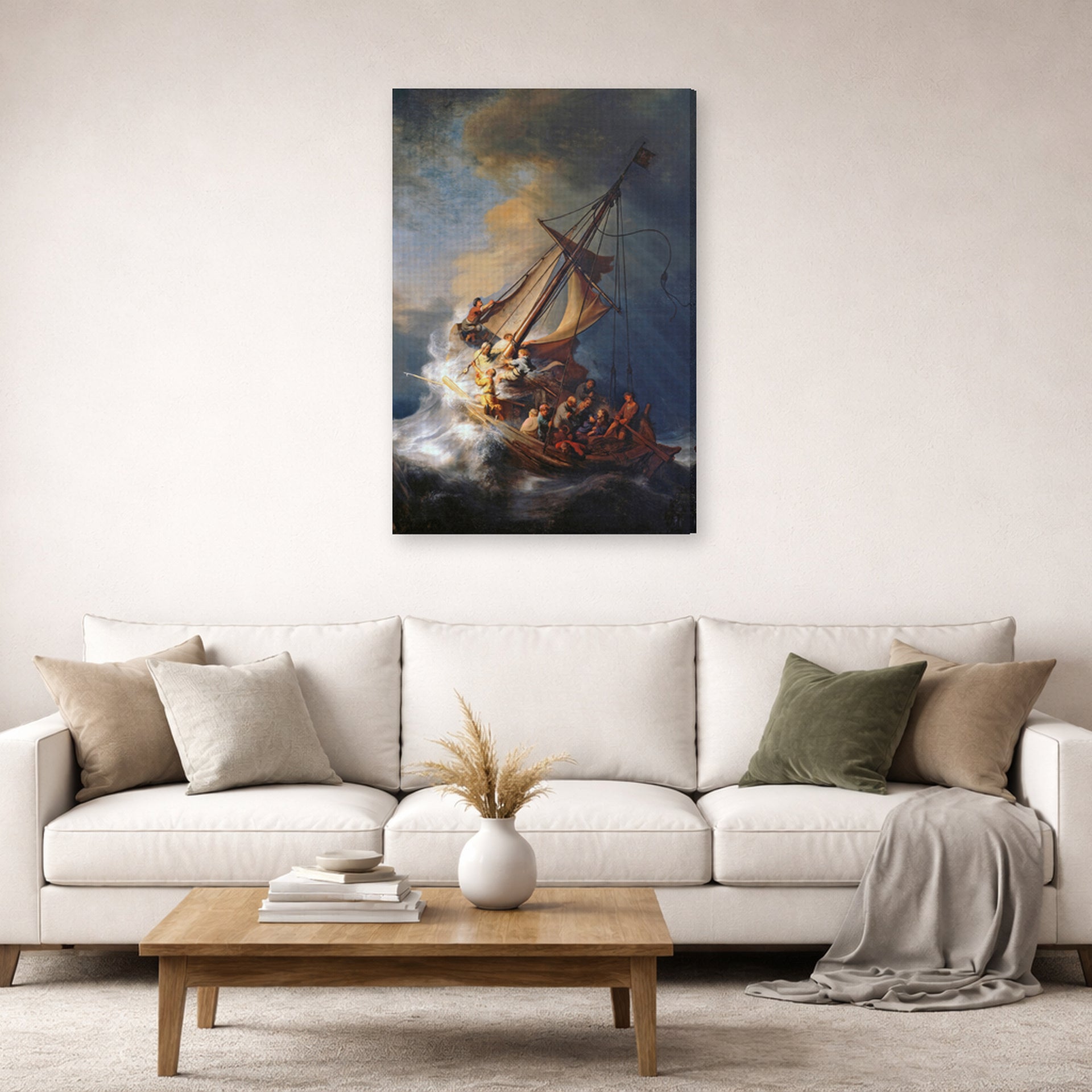 Gallery-wrapped canvas print of Rembrandt's Christ in the Storm on the Lake of Galilee displayed on a wall in a living room