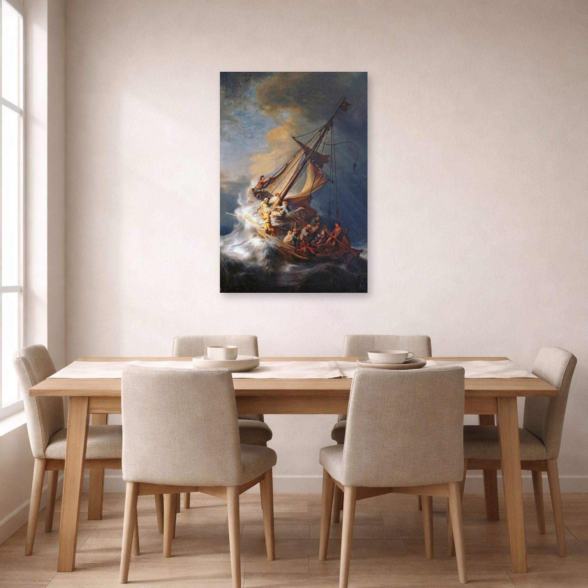 Unframed poster print of Rembrandt's Christ in the Storm on the Lake of Galilee displayed on a wall in a dining room