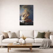 Unframed poster print of Rembrandt's Christ in the Storm on the Lake of Galilee displayed on a wall in a living room