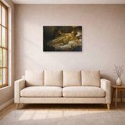 Gallery-wrapped canvas print of Rembrandt's Danaë displayed on a wall in a living room