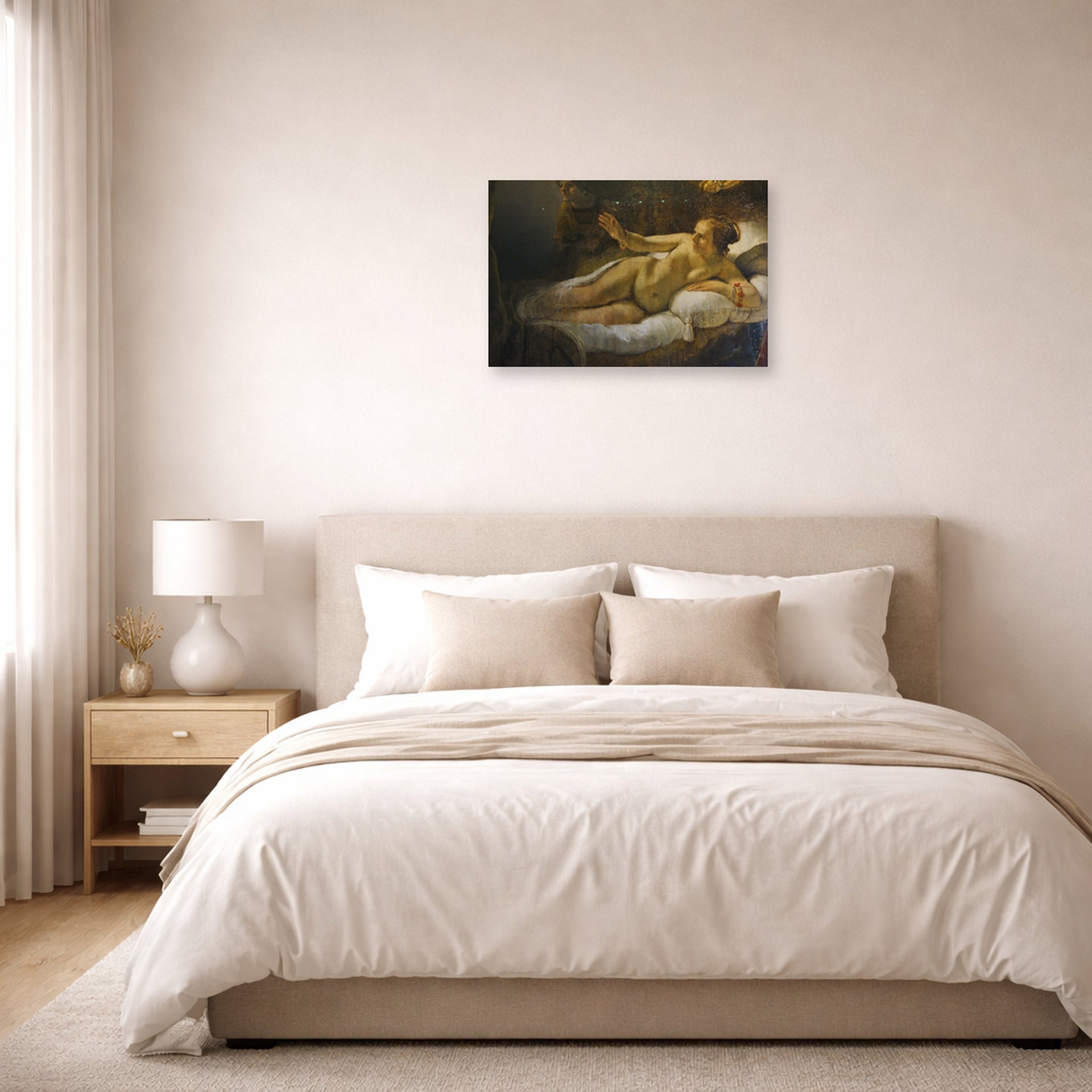 Unframed poster print of Rembrandt's Danaë displayed on a wall in a bedroom
