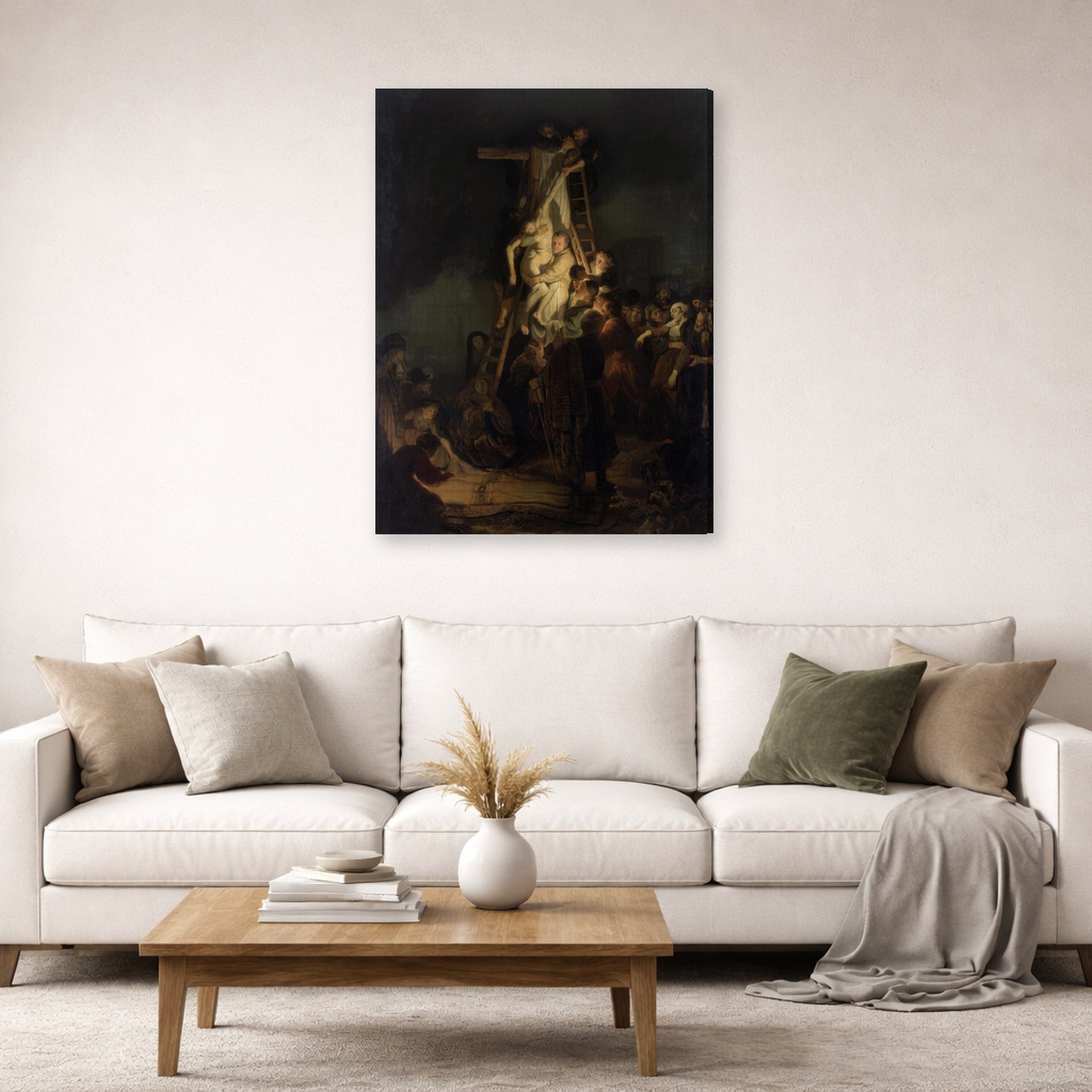 Gallery-wrapped canvas print of Rembrandt's Descent from the Cross displayed on a wall in a living room