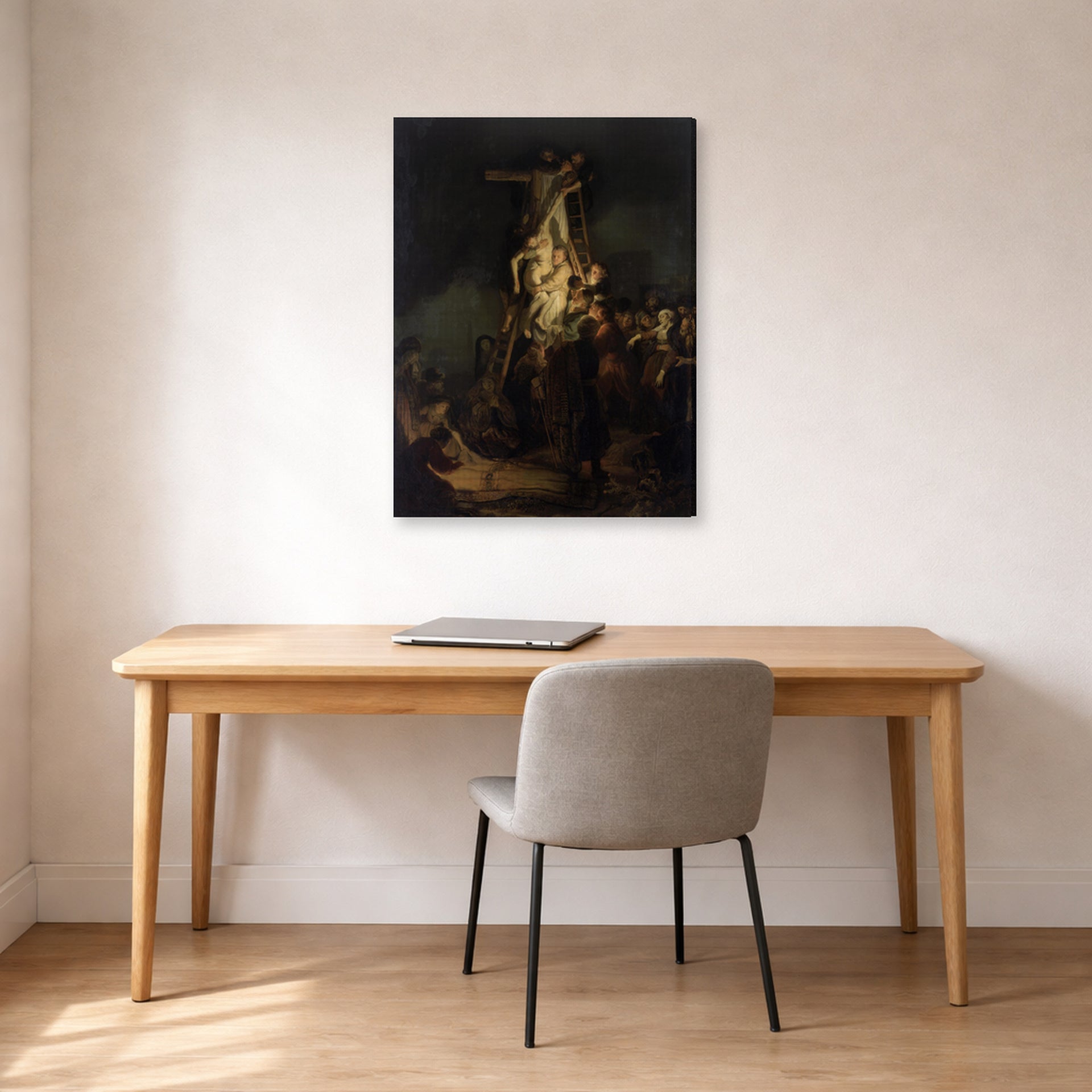 Gallery-wrapped canvas print of Rembrandt's Descent from the Cross displayed on a wall in an office