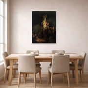Unframed poster print of Rembrandt's Descent from the Cross displayed on a wall in a dining room