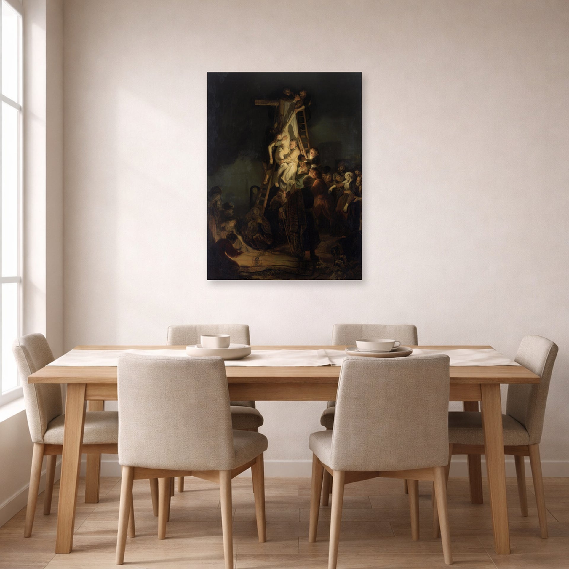 Unframed poster print of Rembrandt's Descent from the Cross displayed on a wall in a dining room