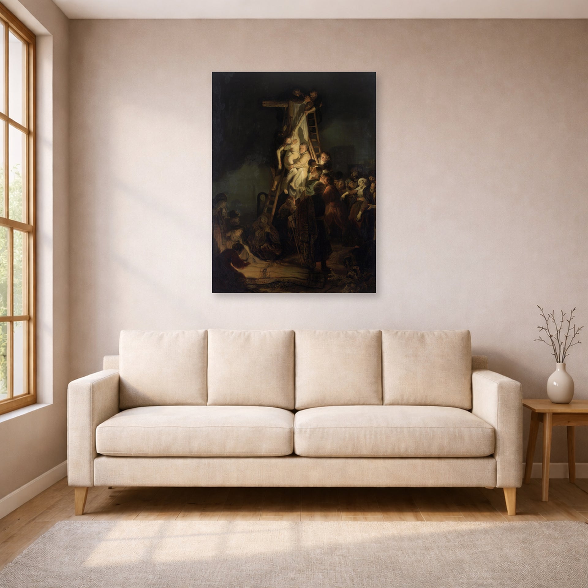 Unframed poster print of Rembrandt's Descent from the Cross displayed on a wall in a living room