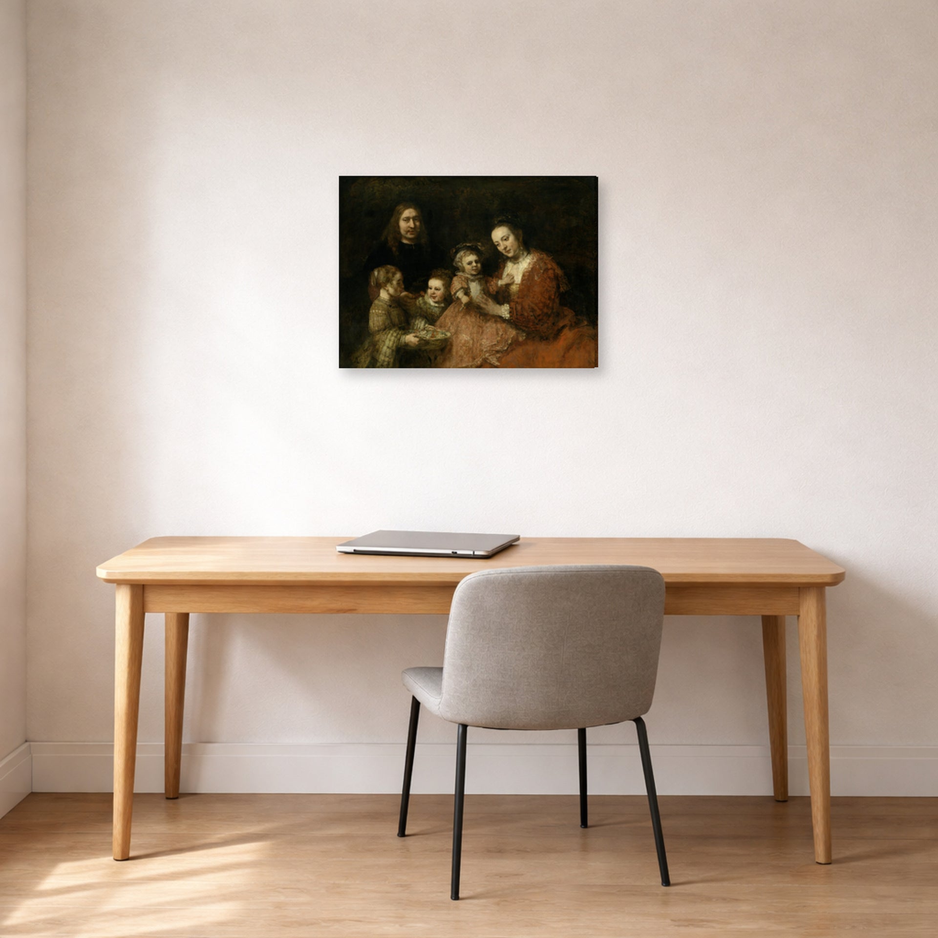 Gallery-wrapped canvas print of Rembrandt's Family Group displayed on a wall in an office