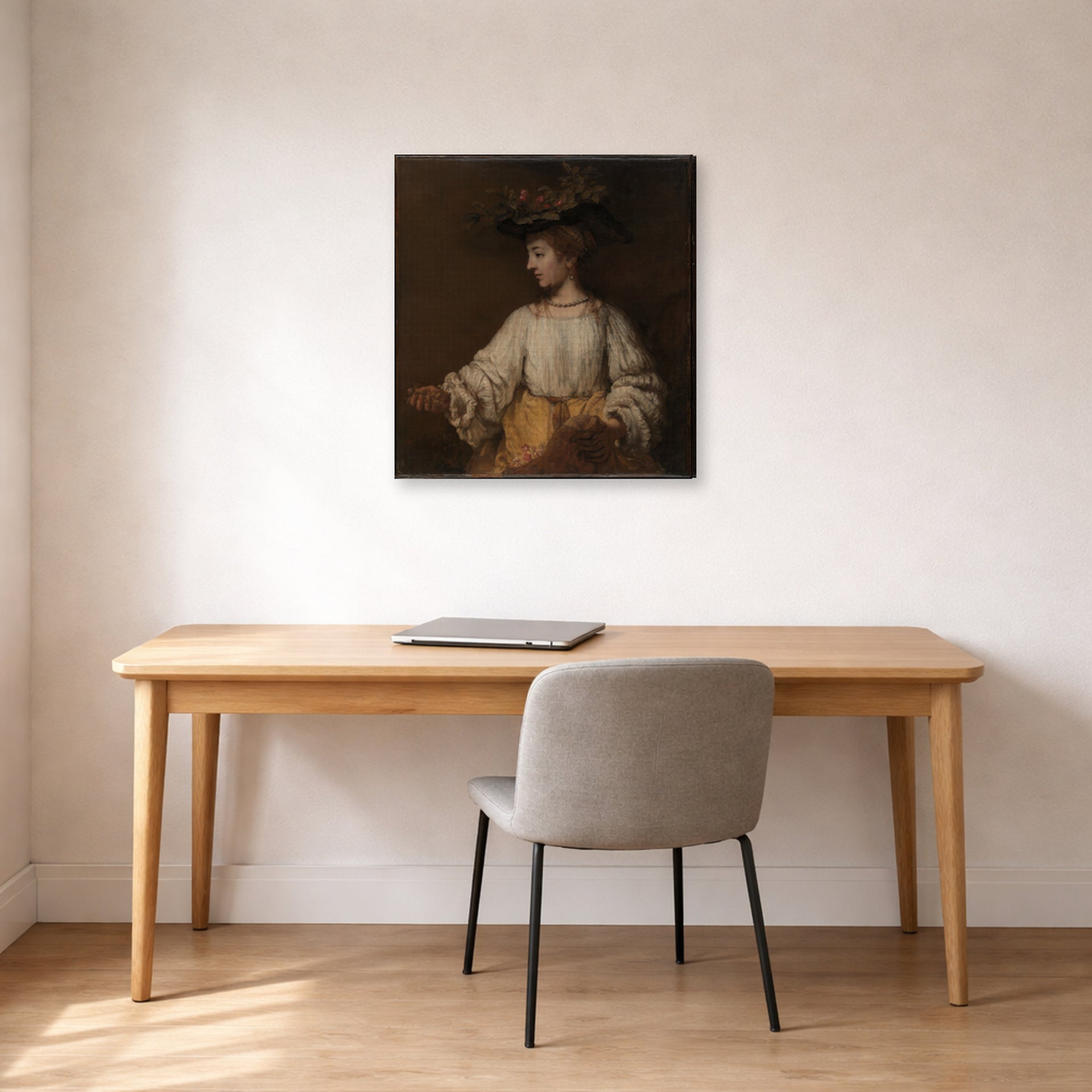 Gallery-wrapped canvas print of Rembrandt's Flora displayed on a wall in an office