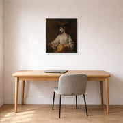 Unframed poster print of Rembrandt's Flora displayed on a wall in an office