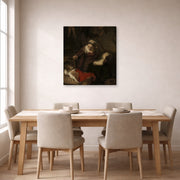 Gallery-wrapped canvas print of Rembrandt's Holy Family displayed on a wall in a dining room