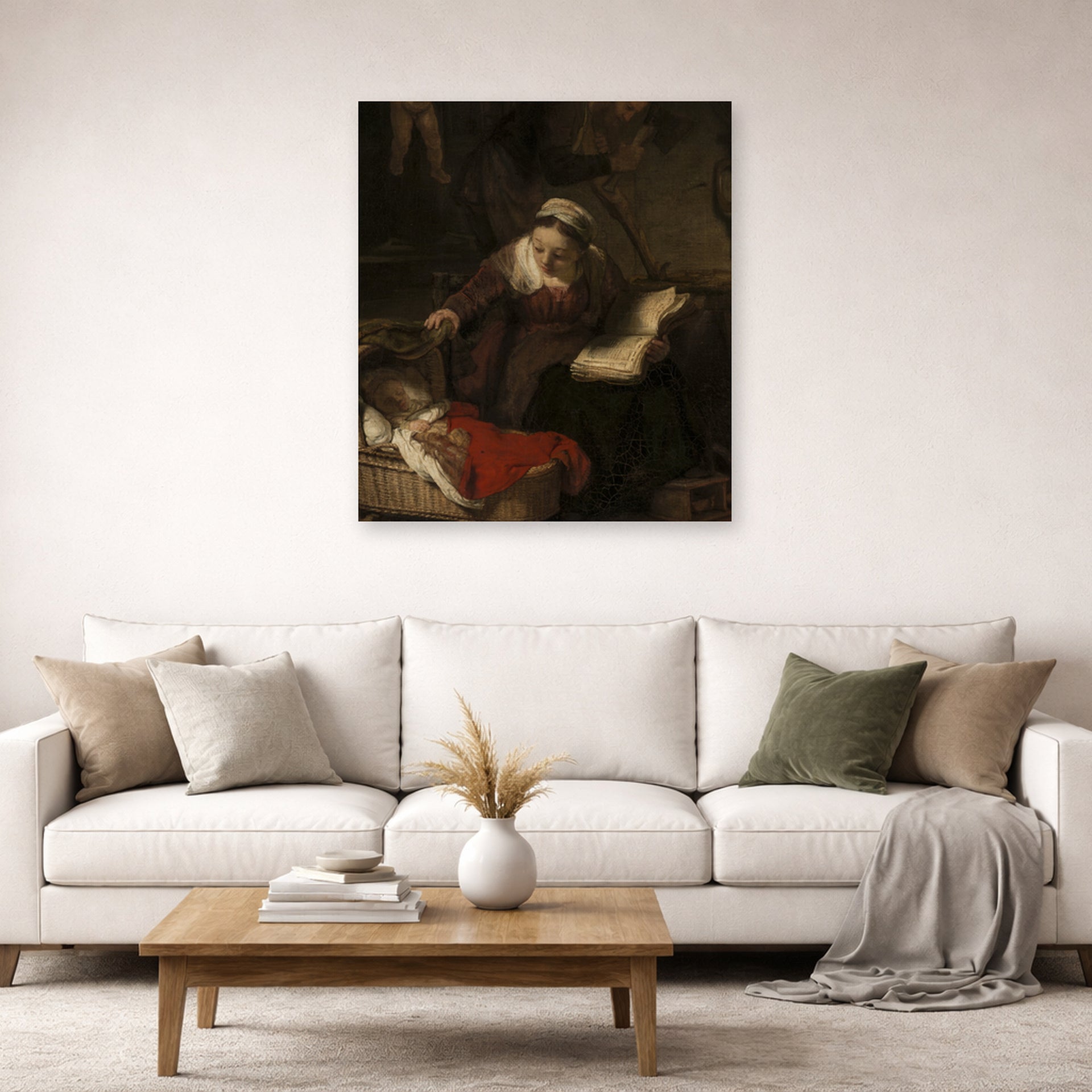 Unframed poster print of Rembrandt's Holy Family displayed on a wall in a living room