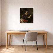 Unframed poster print of Rembrandt's Holy Family displayed on a wall in an office
