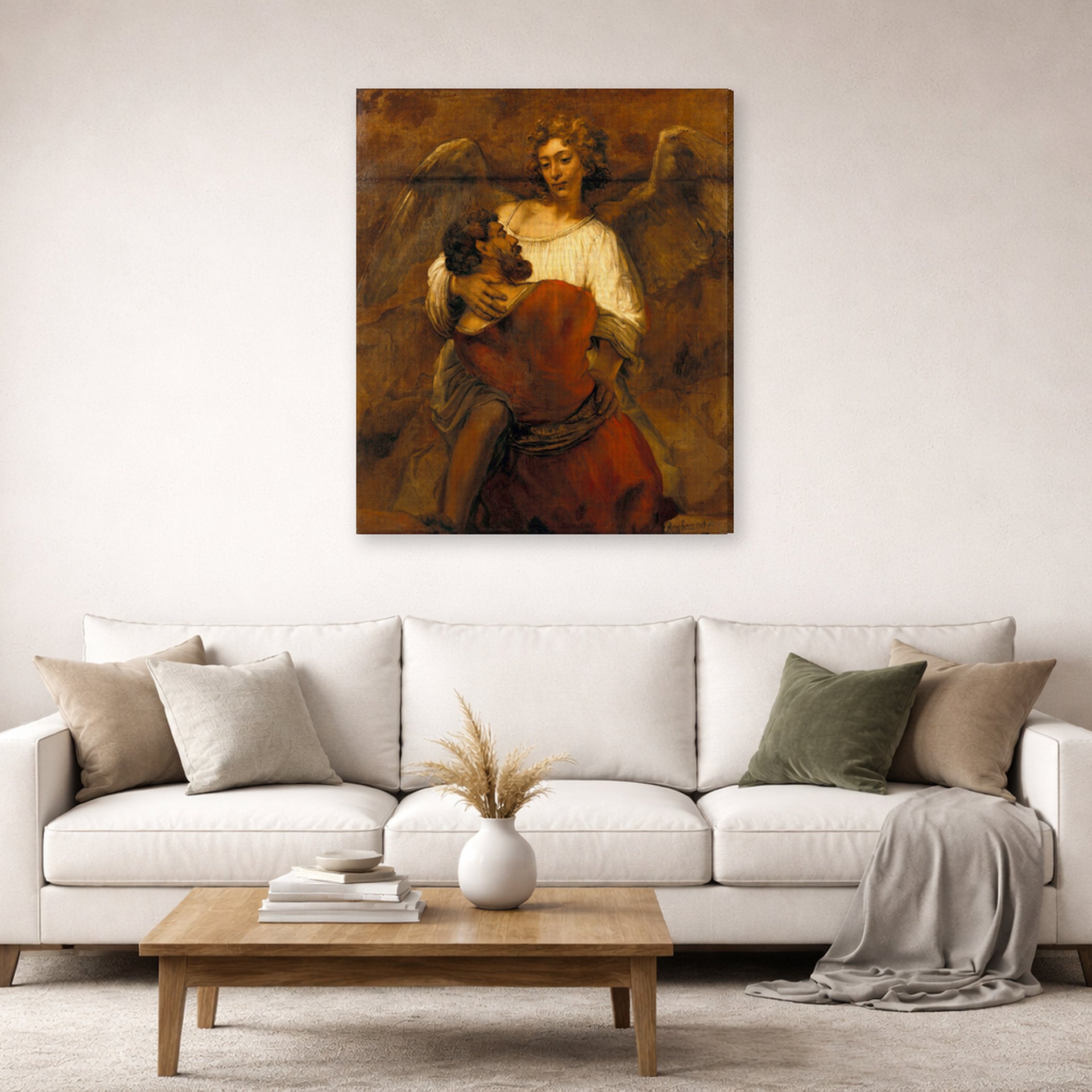 Gallery-wrapped canvas print of Rembrandt's Jacob Wrestling with the Angel displayed on a wall in a living room