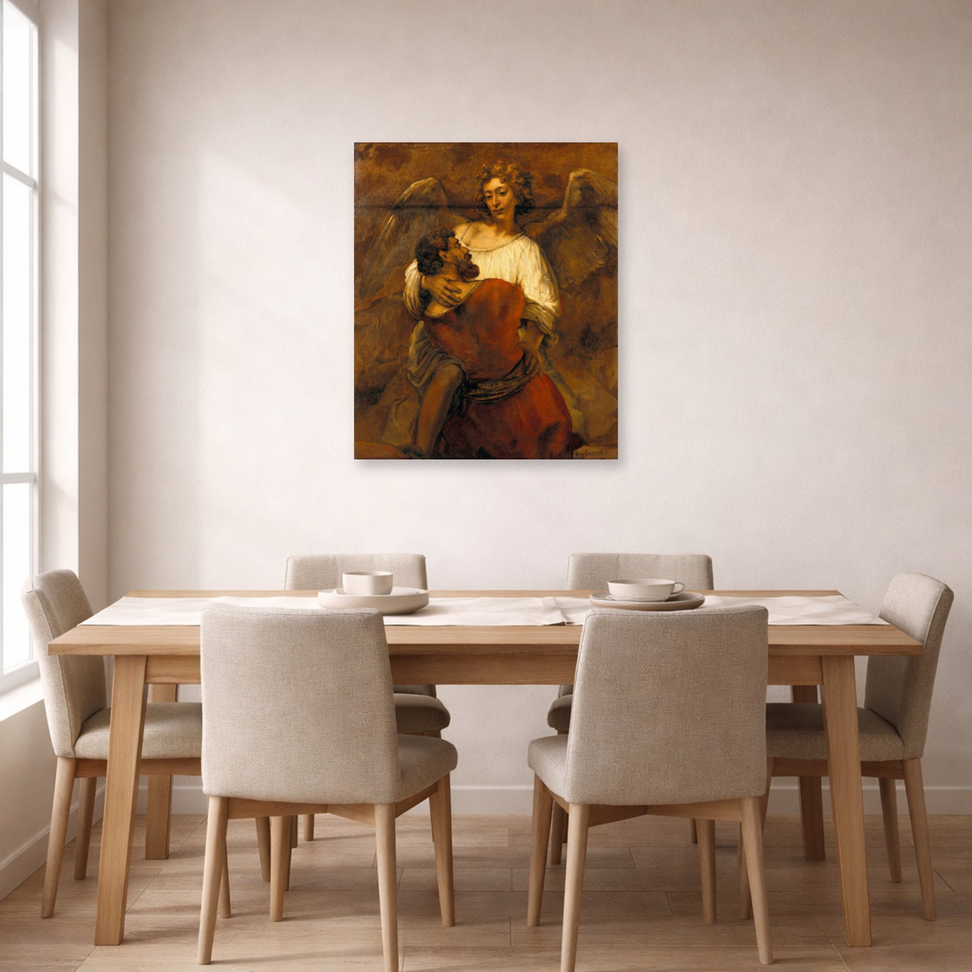 Unframed poster print of Rembrandt's Jacob Wrestling with the Angel displayed on a wall in a dining room