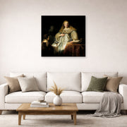 Unframed poster print of Rembrandt's Judith at the Banquet of Holofernes (artemisia) displayed on a wall in a living room