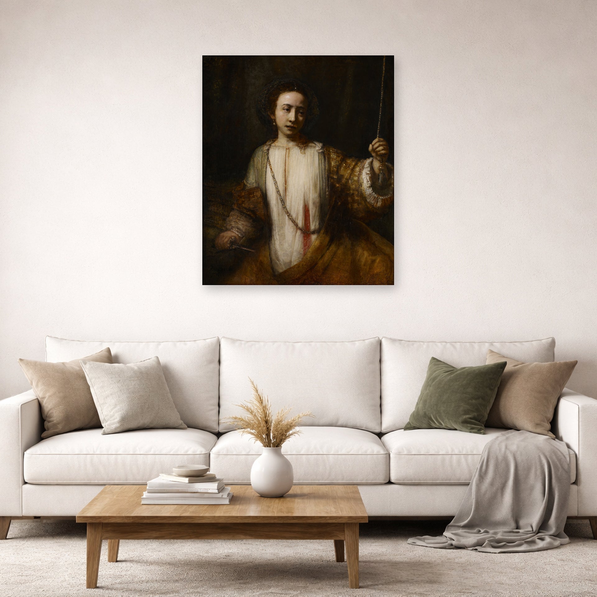 Unframed poster print of Rembrandt's Lucretia displayed on a wall in a living room
