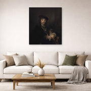 Gallery-wrapped canvas print of Rembrandt's Man with a Sword displayed on a wall in a living room