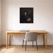 Unframed poster print of Rembrandt's Man with a Sword displayed on a wall in an office
