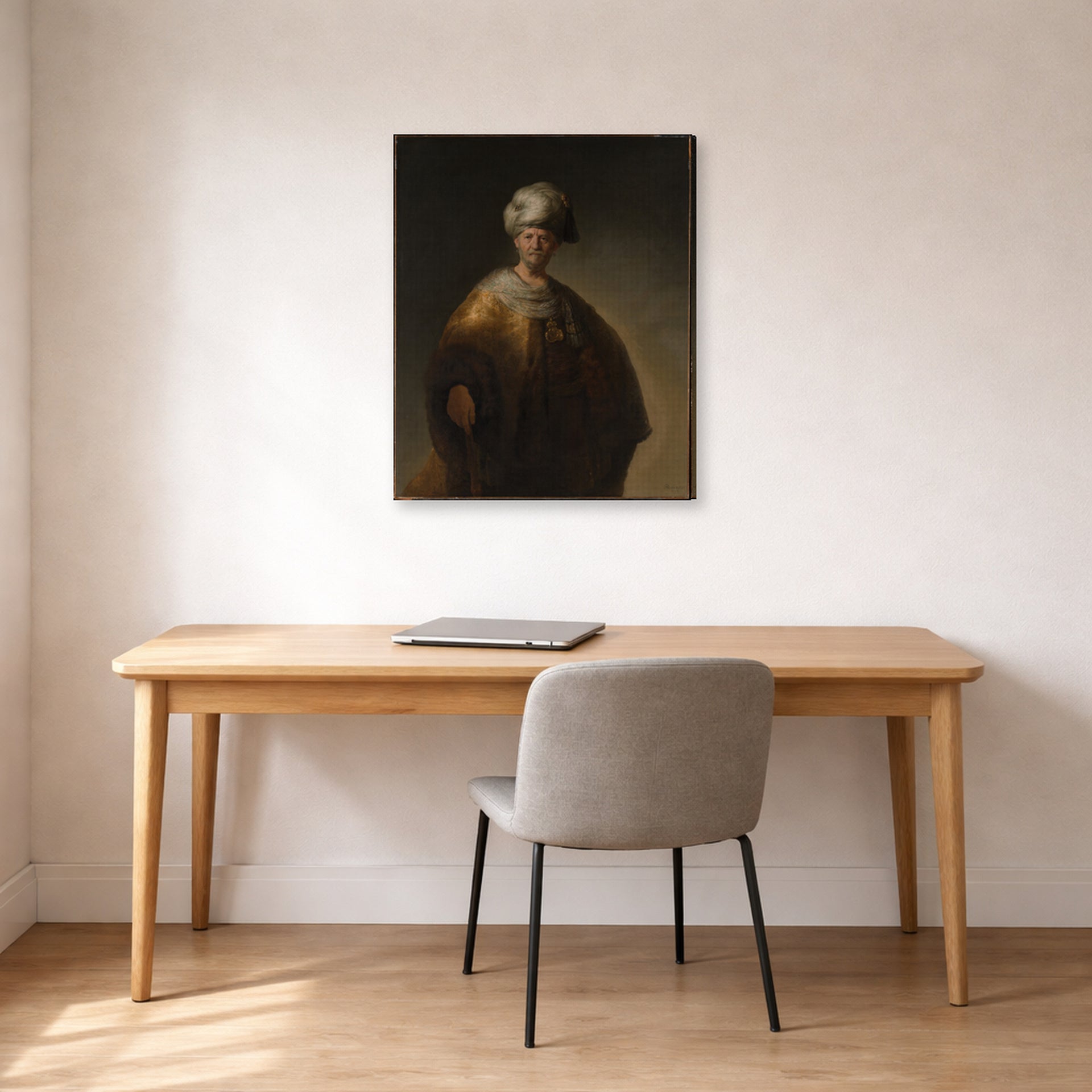 Gallery-wrapped canvas print of Rembrandt's Man in Oriental Costume displayed on a wall in an office