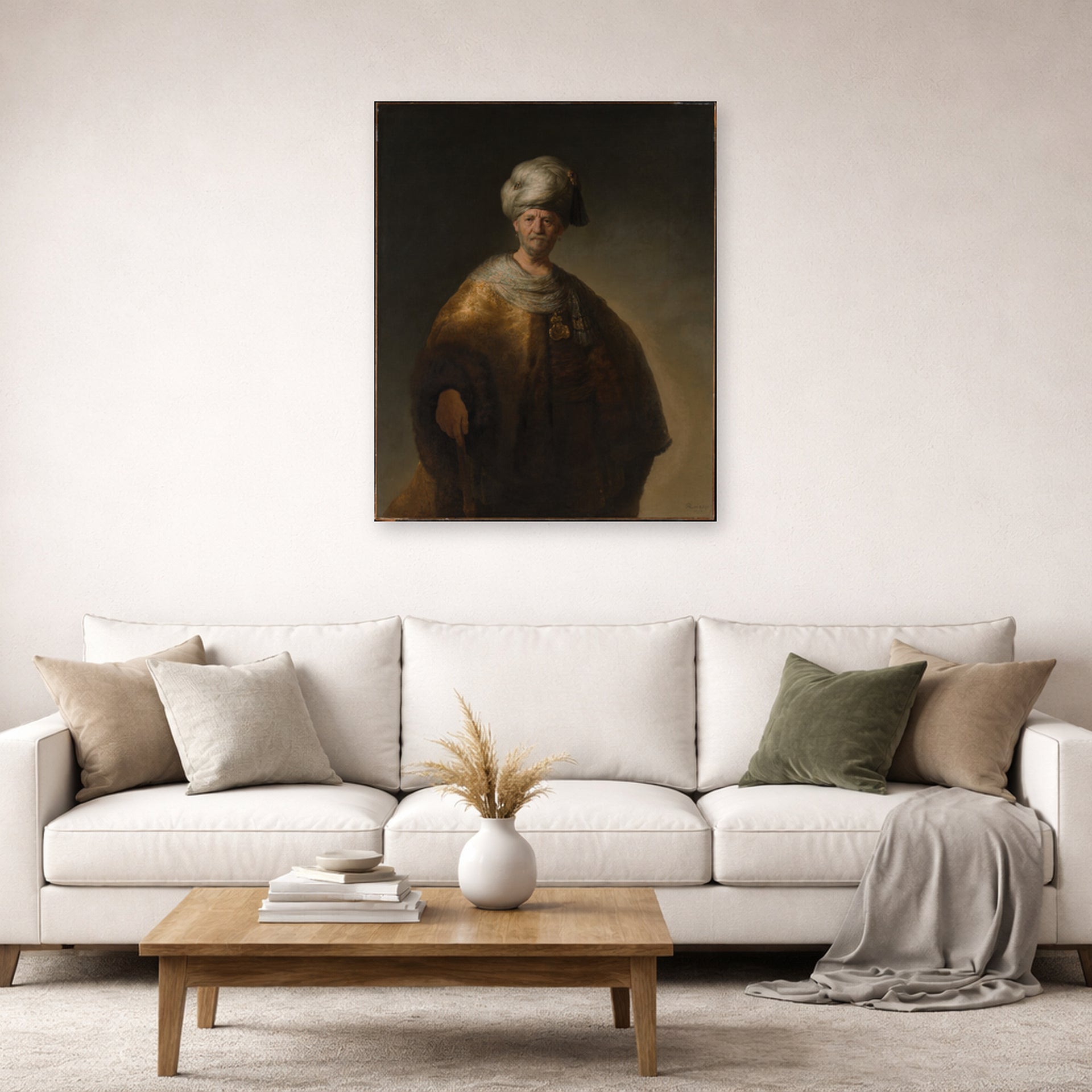 Unframed poster print of Rembrandt's Man in Oriental Costume displayed on a wall in a living room