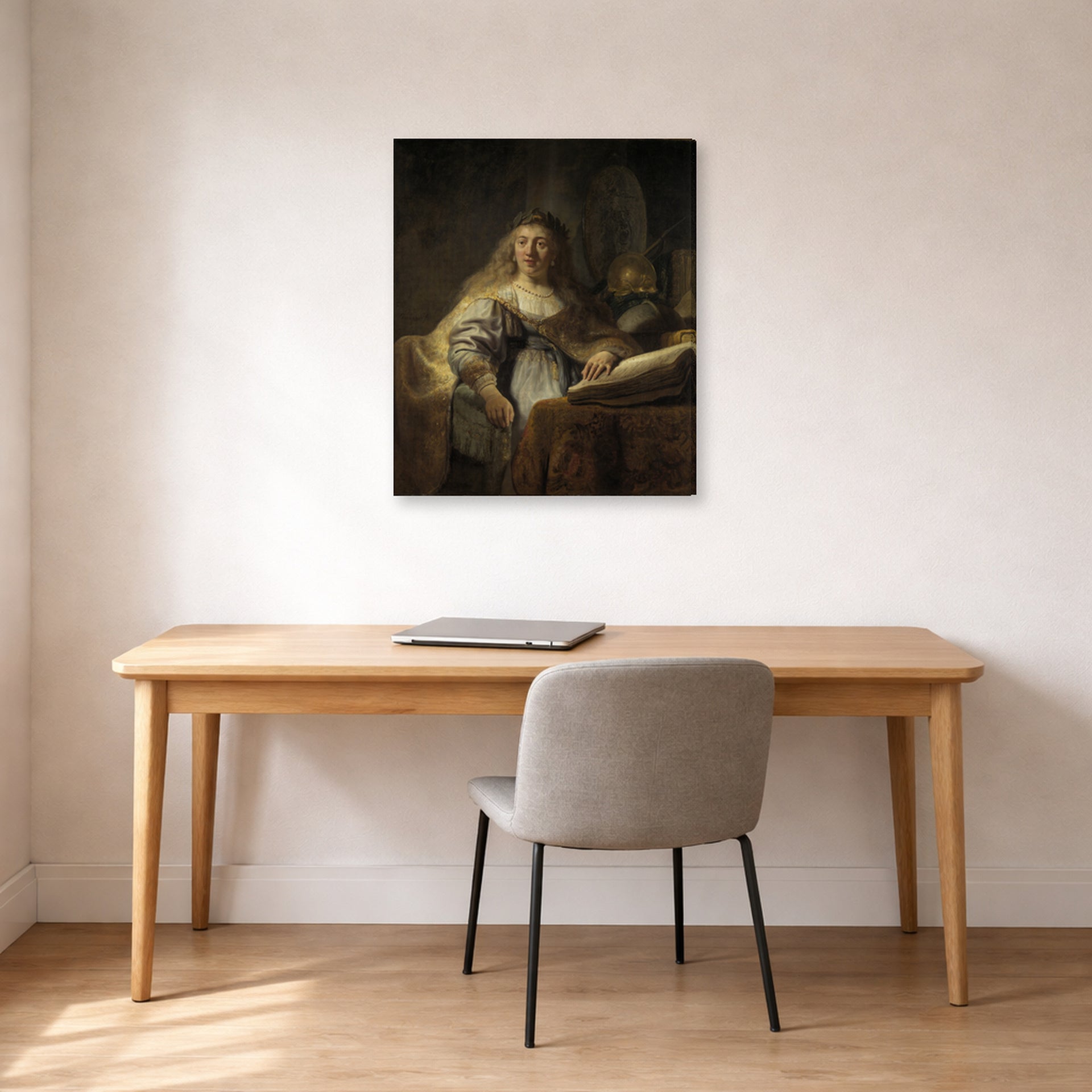 Gallery-wrapped canvas print of Rembrandt's Minerva in Her Study displayed on a wall in an office