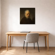 Gallery-wrapped canvas print of Rembrandt's Old Man with Beard displayed on a wall in an office
