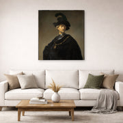 Gallery-wrapped canvas print of Rembrandt's Old Man with a Gold Chain displayed on a wall in a living room