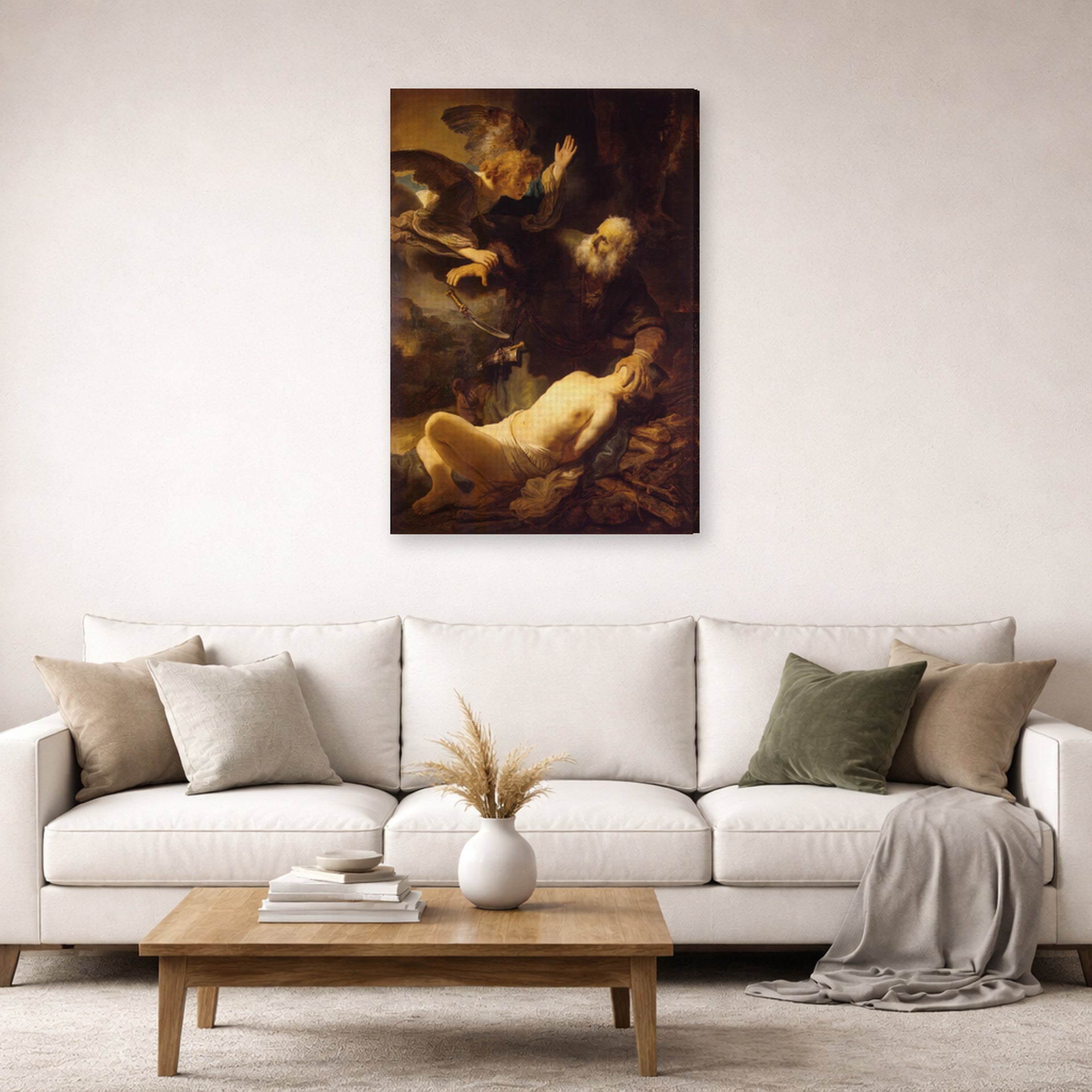 Gallery-wrapped canvas print of Rembrandt's Sacrifice of Isaac displayed on a wall in a living room