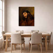 Gallery-wrapped canvas print of Rembrandt's Study for the Head of Young Man displayed on a wall in a dining room
