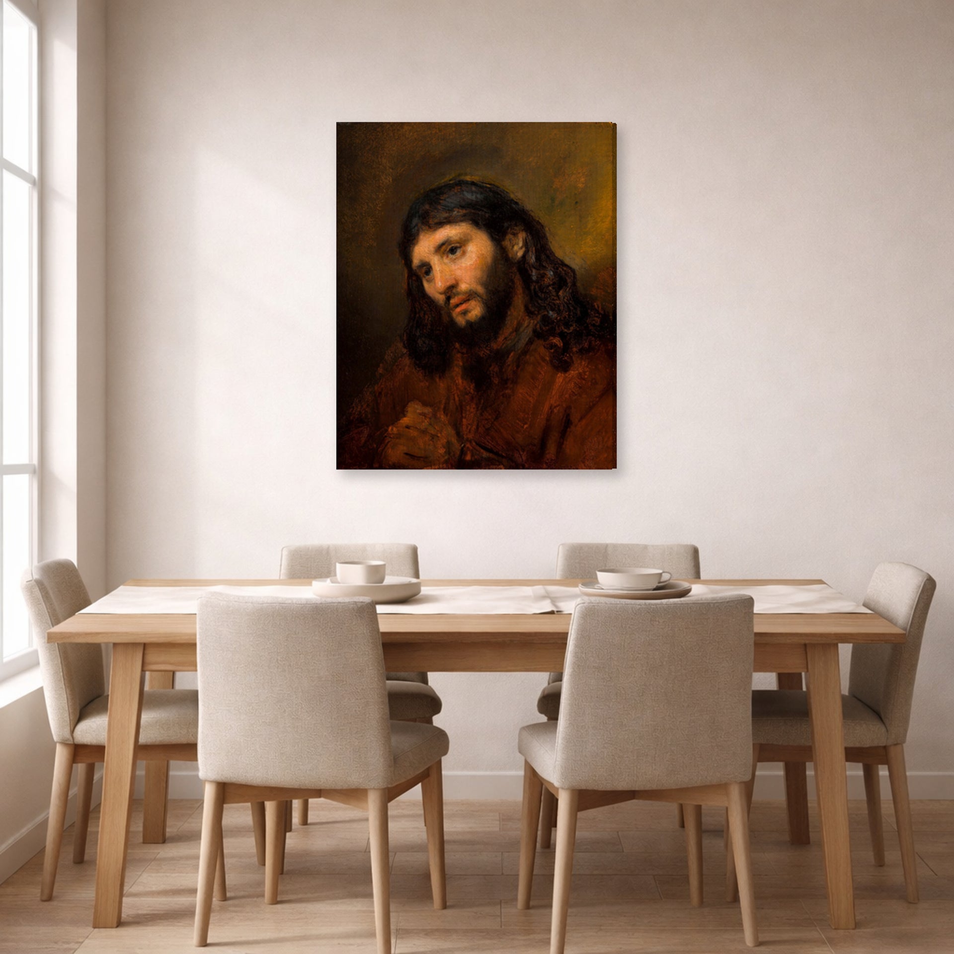Gallery-wrapped canvas print of Rembrandt's Study for the Head of Young Man displayed on a wall in a dining room